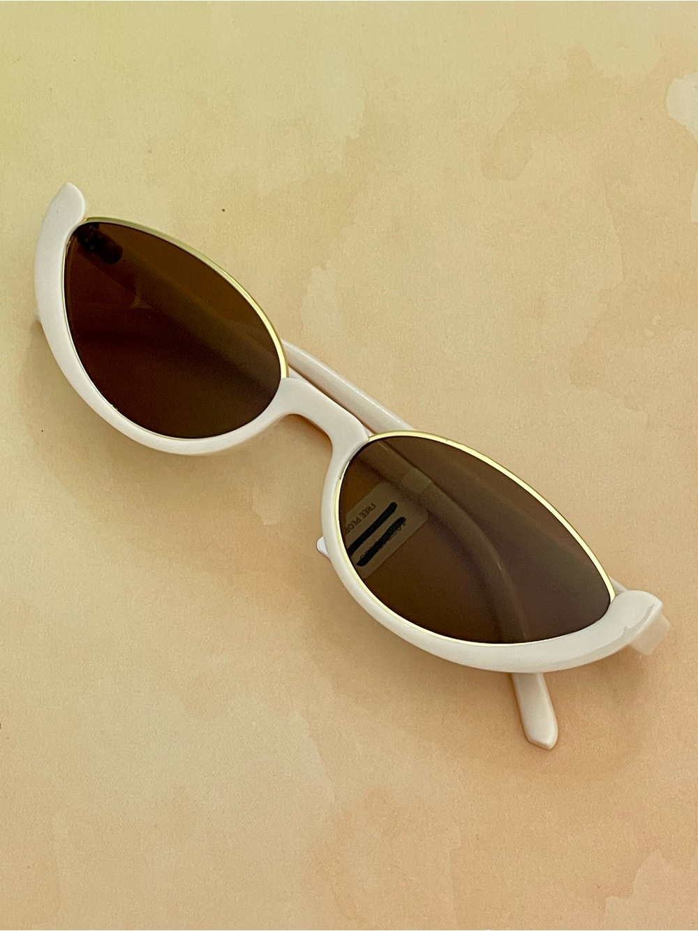 Free People Ivory Slim Oval Sunglasses with Gold Trim